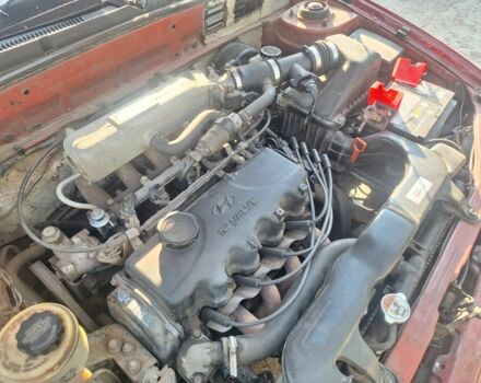 Красный Хендай Акцент, объемом двигателя 1.5 л и пробегом 150 тыс. км за 2700 $, фото 3 на Automoto.ua