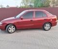 Красный Хендай Акцент, объемом двигателя 1.5 л и пробегом 150 тыс. км за 2700 $, фото 2 на Automoto.ua