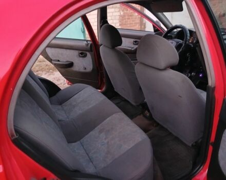 Красный Хендай Акцент, объемом двигателя 1.5 л и пробегом 348 тыс. км за 1500 $, фото 7 на Automoto.ua