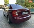 Червоний Хендай Акцент, об'ємом двигуна 1.4 л та пробігом 129 тис. км за 5990 $, фото 8 на Automoto.ua