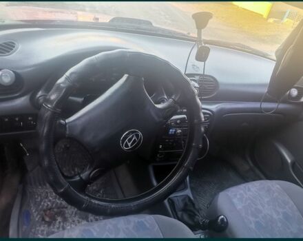 Красный Хендай Акцент, объемом двигателя 1.5 л и пробегом 230 тыс. км за 2079 $, фото 5 на Automoto.ua