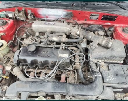 Красный Хендай Акцент, объемом двигателя 1.5 л и пробегом 230 тыс. км за 2079 $, фото 8 на Automoto.ua