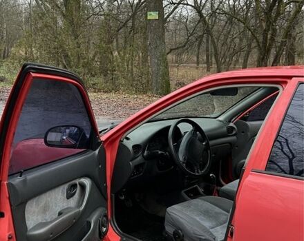 Красный Хендай Акцент, объемом двигателя 1.3 л и пробегом 300 тыс. км за 1200 $, фото 14 на Automoto.ua