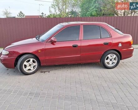 Красный Хендай Акцент, объемом двигателя 1.5 л и пробегом 294 тыс. км за 2700 $, фото 2 на Automoto.ua