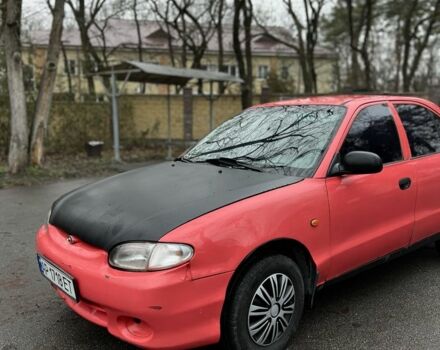 Красный Хендай Акцент, объемом двигателя 1.3 л и пробегом 300 тыс. км за 1200 $, фото 3 на Automoto.ua