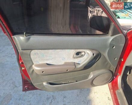 Красный Хендай Акцент, объемом двигателя 1.5 л и пробегом 294 тыс. км за 2700 $, фото 7 на Automoto.ua