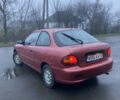 Червоний Хендай Акцент, об'ємом двигуна 1.4 л та пробігом 230 тис. км за 1750 $, фото 2 на Automoto.ua