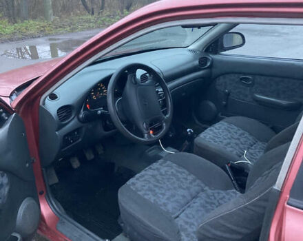 Червоний Хендай Акцент, об'ємом двигуна 1.4 л та пробігом 230 тис. км за 1750 $, фото 6 на Automoto.ua