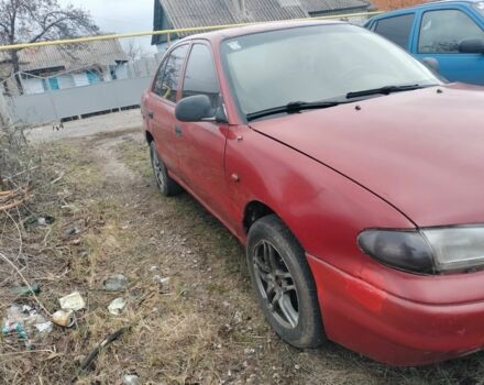 Красный Хендай Акцент, объемом двигателя 1.3 л и пробегом 470 тыс. км за 650 $, фото 4 на Automoto.ua