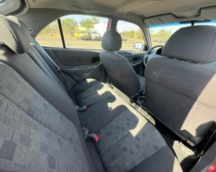 Червоний Хендай Акцент, об'ємом двигуна 1.6 л та пробігом 161 тис. км за 1700 $, фото 13 на Automoto.ua