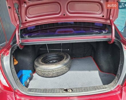 Красный Хендай Акцент, объемом двигателя 1.4 л и пробегом 258 тыс. км за 5200 $, фото 16 на Automoto.ua