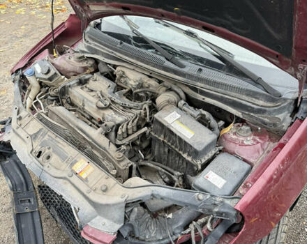 Красный Хендай Акцент, объемом двигателя 1.4 л и пробегом 186 тыс. км за 1500 $, фото 3 на Automoto.ua