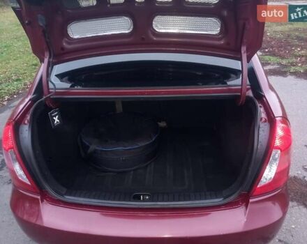 Красный Хендай Акцент, объемом двигателя 1.4 л и пробегом 200 тыс. км за 4100 $, фото 13 на Automoto.ua