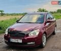 Красный Хендай Акцент, объемом двигателя 1.4 л и пробегом 238 тыс. км за 3900 $, фото 1 на Automoto.ua