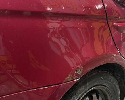 Червоний Хендай Акцент, об'ємом двигуна 1.6 л та пробігом 196 тис. км за 5800 $, фото 7 на Automoto.ua