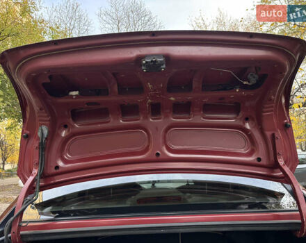 Красный Хендай Акцент, объемом двигателя 1.4 л и пробегом 200 тыс. км за 4750 $, фото 13 на Automoto.ua