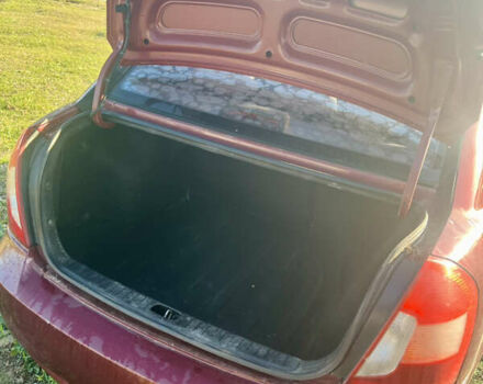 Красный Хендай Акцент, объемом двигателя 1.4 л и пробегом 261 тыс. км за 3900 $, фото 4 на Automoto.ua