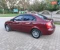 Красный Хендай Акцент, объемом двигателя 1.49 л и пробегом 250 тыс. км за 4450 $, фото 4 на Automoto.ua