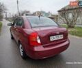 Красный Хендай Акцент, объемом двигателя 1.4 л и пробегом 237 тыс. км за 3900 $, фото 7 на Automoto.ua