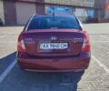 Красный Хендай Акцент, объемом двигателя 1.4 л и пробегом 325 тыс. км за 4000 $, фото 7 на Automoto.ua