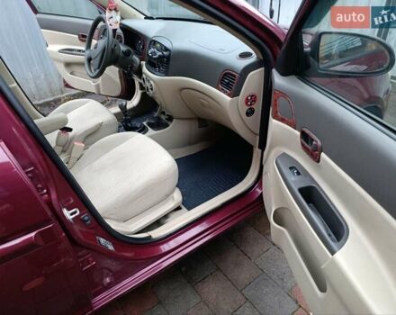 Красный Хендай Акцент, объемом двигателя 1.4 л и пробегом 156 тыс. км за 4700 $, фото 11 на Automoto.ua