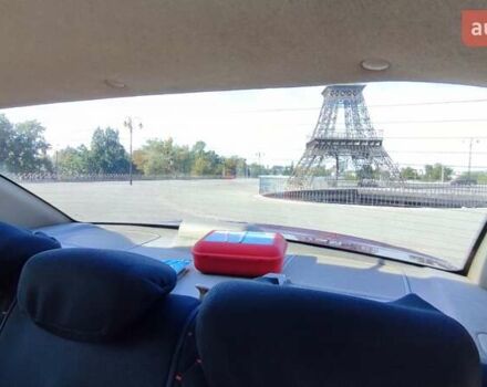 Красный Хендай Акцент, объемом двигателя 1.4 л и пробегом 325 тыс. км за 4000 $, фото 10 на Automoto.ua