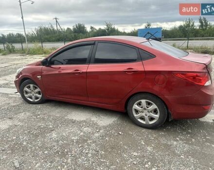 Красный Хендай Акцент, объемом двигателя 1.6 л и пробегом 250 тыс. км за 9800 $, фото 1 на Automoto.ua