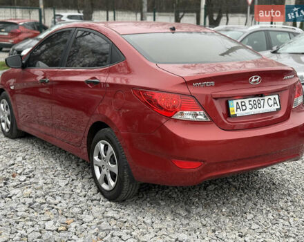 Красный Хендай Акцент, объемом двигателя 1.4 л и пробегом 172 тыс. км за 6800 $, фото 7 на Automoto.ua