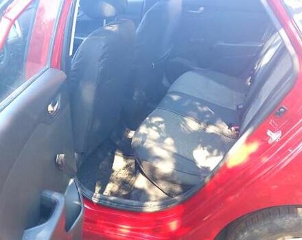 Красный Хендай Акцент, объемом двигателя 1.37 л и пробегом 144 тыс. км за 9600 $, фото 2 на Automoto.ua