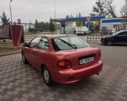 Червоний Хендай Акцент, об'ємом двигуна 1.4 л та пробігом 200 тис. км за 1250 $, фото 5 на Automoto.ua