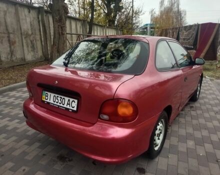 Червоний Хендай Акцент, об'ємом двигуна 1.4 л та пробігом 200 тис. км за 1250 $, фото 1 на Automoto.ua