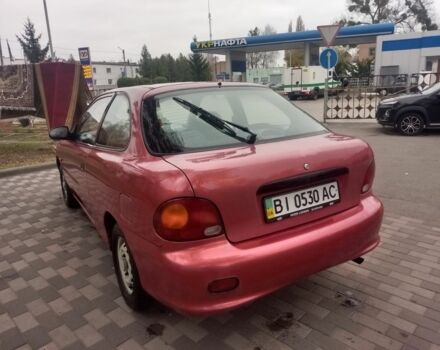Червоний Хендай Акцент, об'ємом двигуна 1.4 л та пробігом 200 тис. км за 1250 $, фото 10 на Automoto.ua