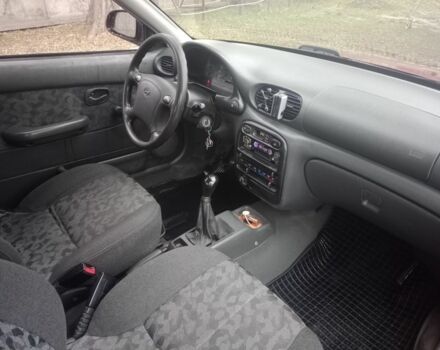 Червоний Хендай Акцент, об'ємом двигуна 1.4 л та пробігом 200 тис. км за 1250 $, фото 9 на Automoto.ua