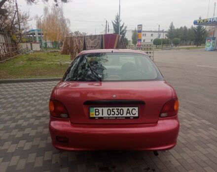 Червоний Хендай Акцент, об'ємом двигуна 1.4 л та пробігом 200 тис. км за 1250 $, фото 6 на Automoto.ua