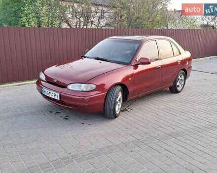 Красный Хендай Акцент, объемом двигателя 1.5 л и пробегом 294 тыс. км за 2700 $, фото 1 на Automoto.ua