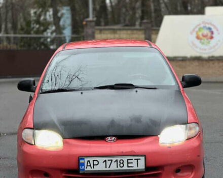 Красный Хендай Акцент, объемом двигателя 1.3 л и пробегом 300 тыс. км за 1200 $, фото 1 на Automoto.ua