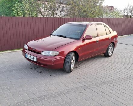 Красный Хендай Акцент, объемом двигателя 1.5 л и пробегом 150 тыс. км за 2700 $, фото 1 на Automoto.ua
