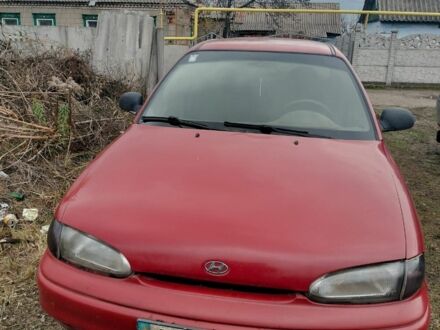 Красный Хендай Акцент, объемом двигателя 1.3 л и пробегом 470 тыс. км за 650 $, фото 1 на Automoto.ua