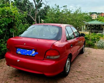 Красный Хендай Акцент, объемом двигателя 1.6 л и пробегом 187 тыс. км за 2300 $, фото 1 на Automoto.ua