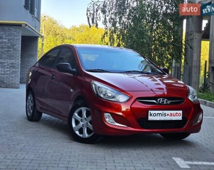 Червоний Хендай Акцент, об'ємом двигуна 1.4 л та пробігом 126 тис. км за 7799 $, фото 1 на Automoto.ua