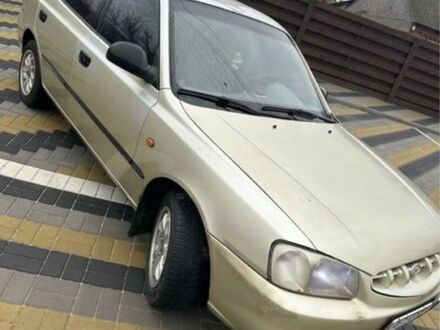 Желтый Хендай Акцент, объемом двигателя 1.3 л и пробегом 380 тыс. км за 1750 $, фото 1 на Automoto.ua