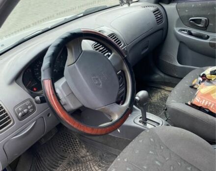 Серый Хендай Акцент, объемом двигателя 1.3 л и пробегом 180 тыс. км за 1999 $, фото 2 на Automoto.ua