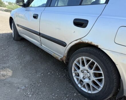 Серый Хендай Акцент, объемом двигателя 1.3 л и пробегом 229 тыс. км за 2200 $, фото 6 на Automoto.ua