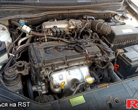 Серый Хендай Акцент, объемом двигателя 1.4 л и пробегом 231 тыс. км за 5400 $, фото 4 на Automoto.ua