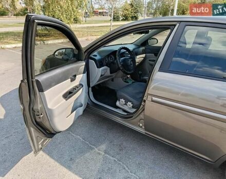 Серый Хендай Акцент, объемом двигателя 1.4 л и пробегом 310 тыс. км за 4500 $, фото 5 на Automoto.ua