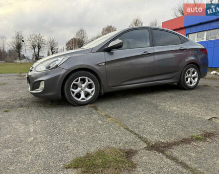 Серый Хендай Акцент, объемом двигателя 1.4 л и пробегом 206 тыс. км за 6400 $, фото 4 на Automoto.ua