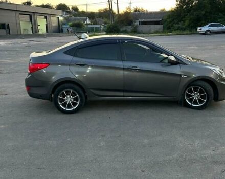 Серый Хендай Акцент, объемом двигателя 1.4 л и пробегом 187 тыс. км за 5800 $, фото 1 на Automoto.ua