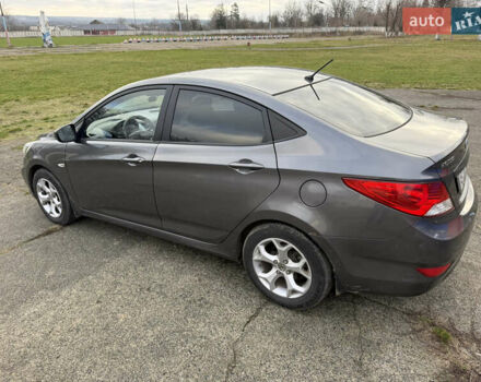 Серый Хендай Акцент, объемом двигателя 1.4 л и пробегом 206 тыс. км за 6400 $, фото 8 на Automoto.ua