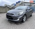 Сірий Хендай Акцент, об'ємом двигуна 1.4 л та пробігом 76 тис. км за 8599 $, фото 1 на Automoto.ua