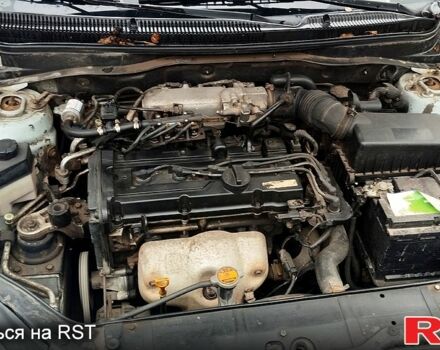 Синий Хендай Акцент, объемом двигателя 1.4 л и пробегом 197 тыс. км за 4200 $, фото 4 на Automoto.ua